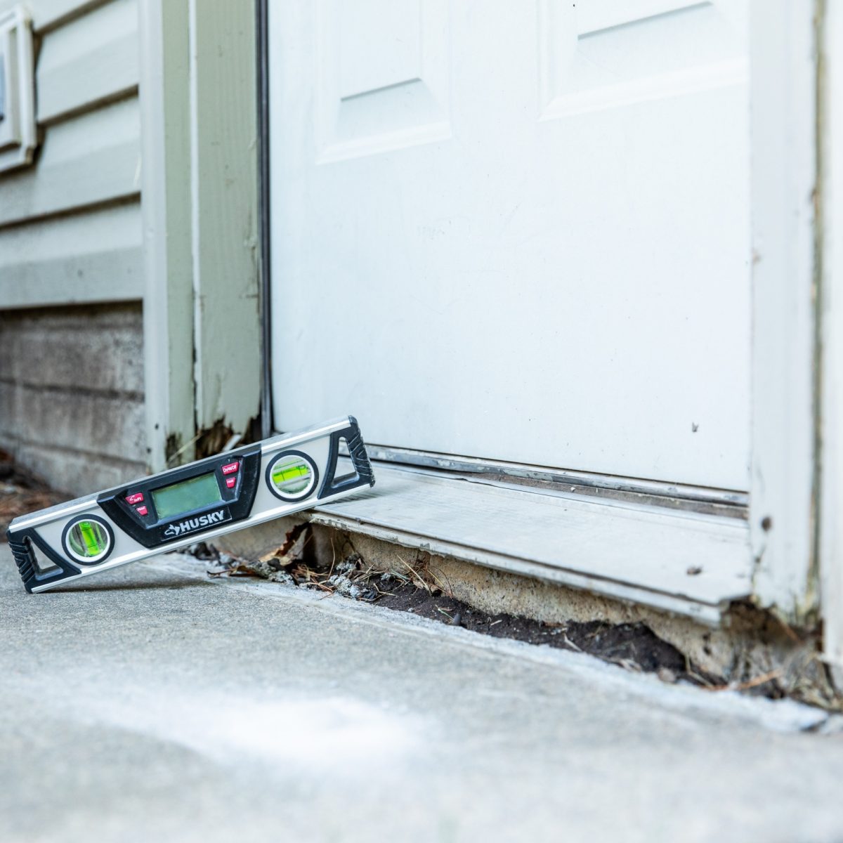 PolyLevel Garage Side Door_Before