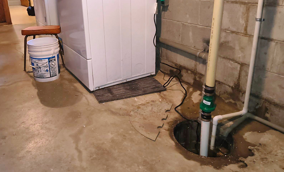 Water in the basement with a working sump pump