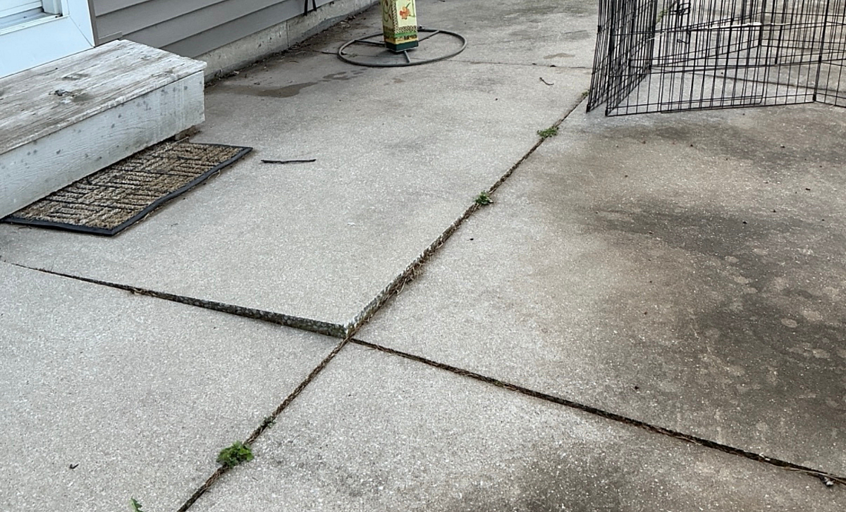 Why does concrete sink common causes of uneven driveways sidewalks and patios